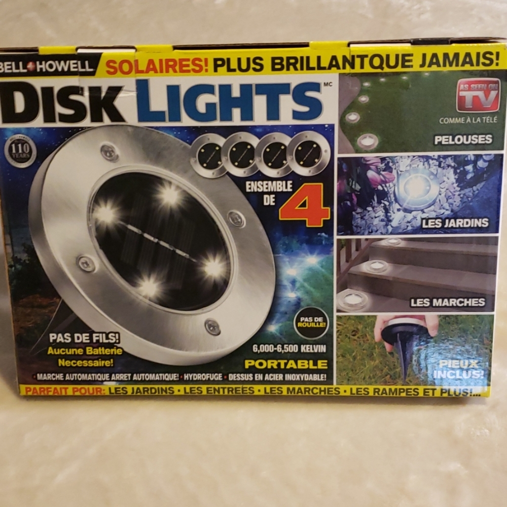 Bell and Howell Disk Lights